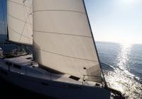 sailing yacht Hanse 505 sailboat bow sails sun burst